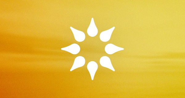 An image of the California Psychics logo, similar to the outline of a lotus from above, over a bright yellow background.
